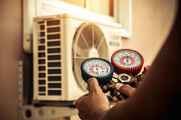 Professional Hvac technician working in Marion, MA